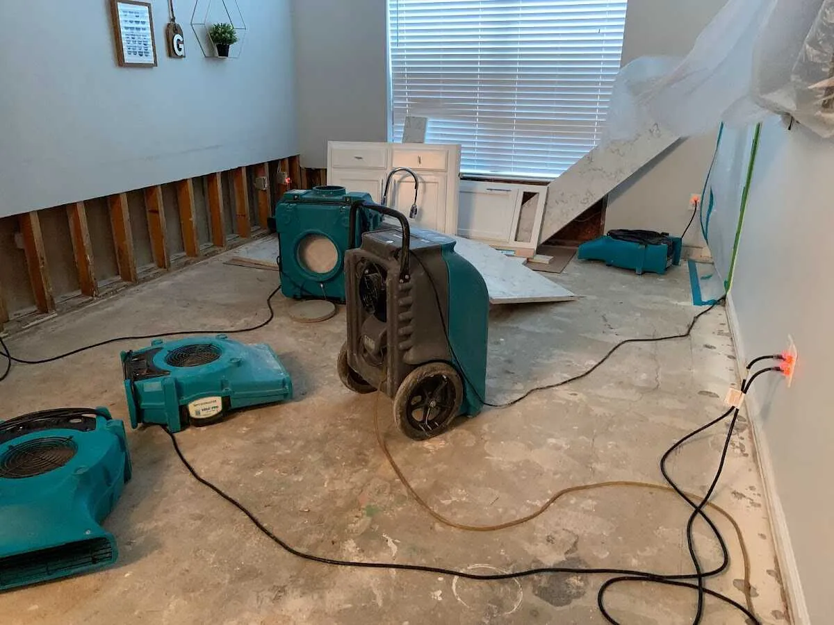 Dehumidifier in flood-cut room for Water Damage Restoration in Ham Lake